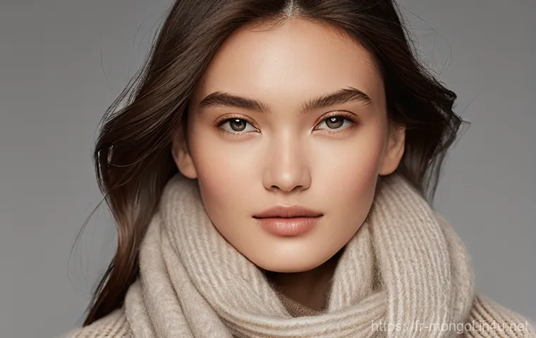 몽골 주요 기념품 - **A collection of exquisite, ultra-soft Gobi cashmere items**, including a gracefully draped scarf, ...